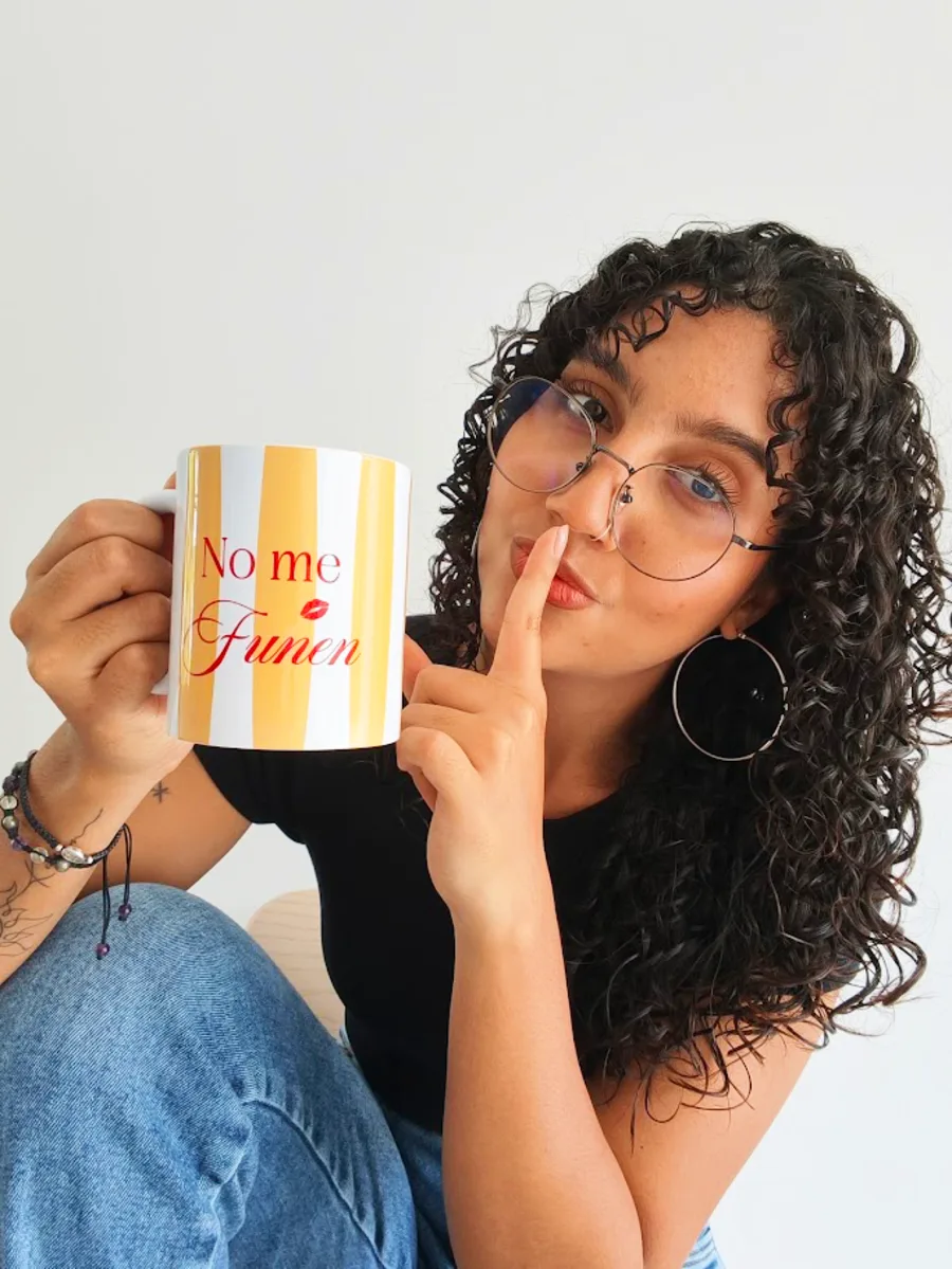 Andy holding one of her personalised mugs